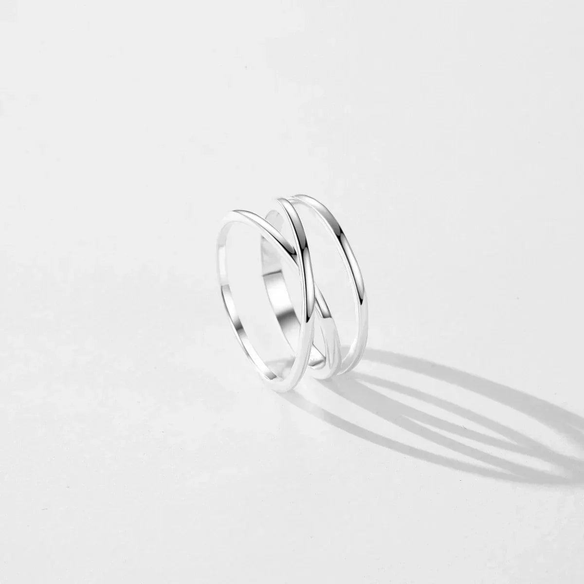 Anello a tre file con motivo a onda